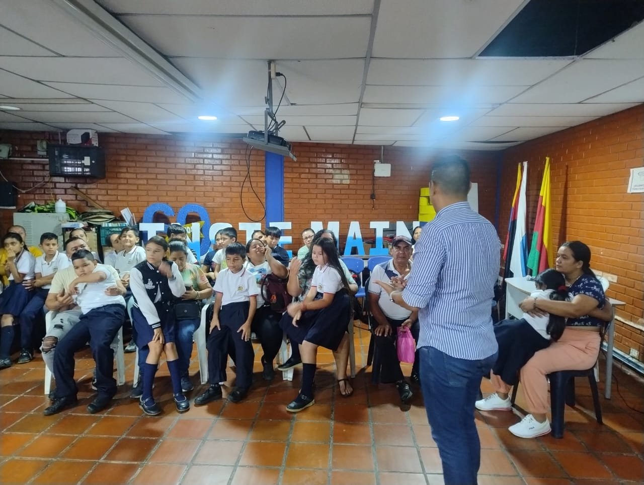 Young people learning together in a community classroom